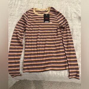 Brand new with tags unworn striped Levi’s shirt. Size Small
